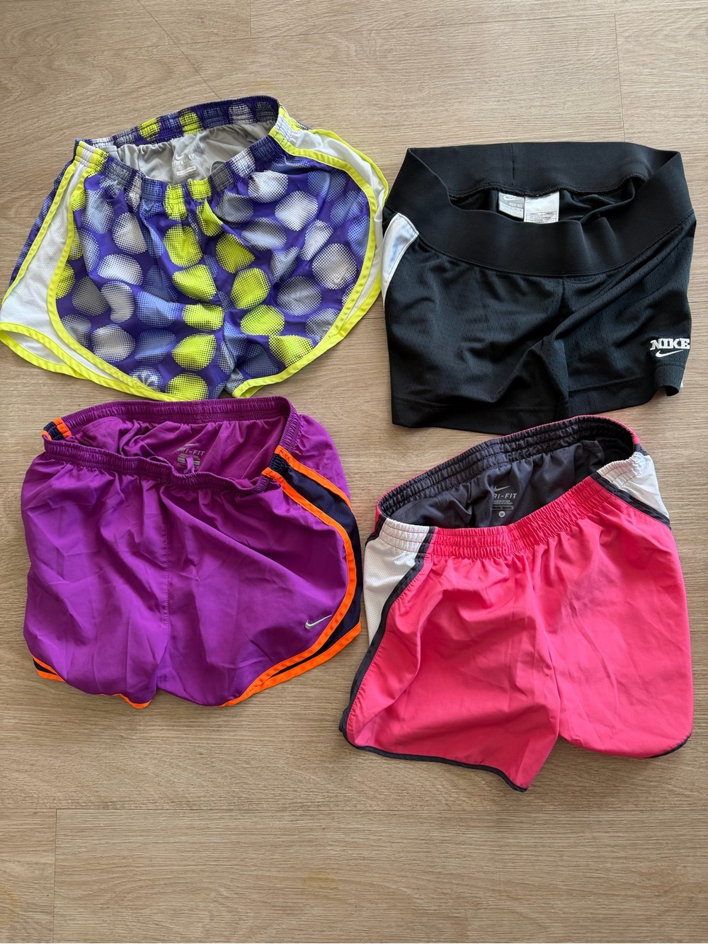Nike Womens 4-Pack Athletic Shorts – Purple, Black, Pink, Magenta